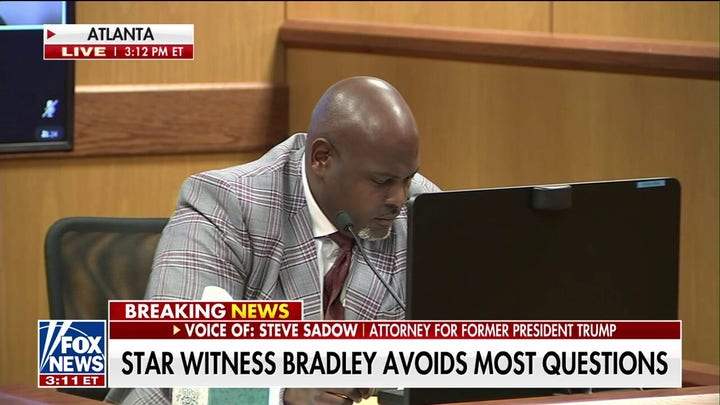 Terrence Bradley appears to mutter 'dang' when confronted with texts about Fani Willis affair
