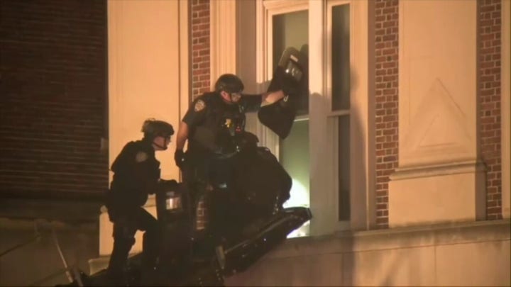 NYPD Emergency Services Unit enters through windows at Hamilton Hall