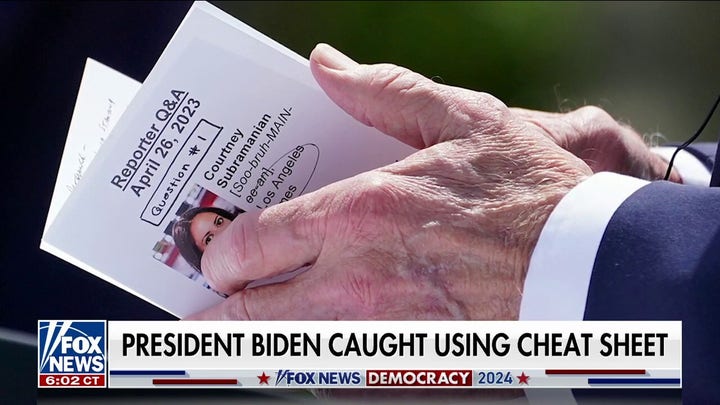 Biden caught using cheat sheet in first press conference since announcing 2024 bid