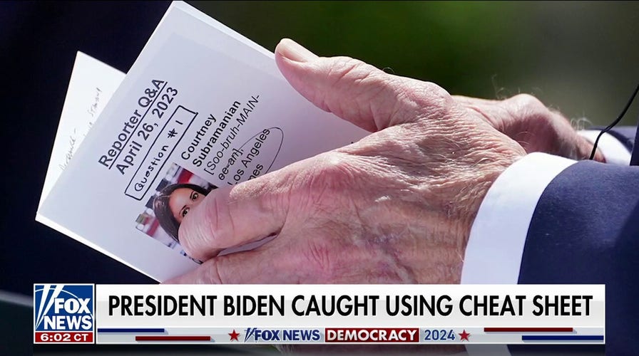 Biden caught using cheat sheet in first press conference since announcing 2024 bid