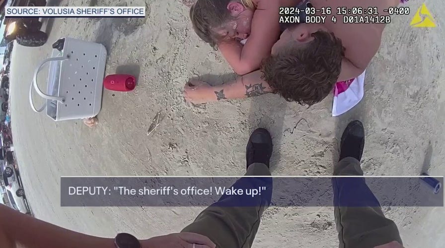 Parents arrested for child neglect after being found passed out on Florida beach