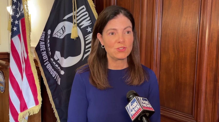 Republican Gov. Kelly Ayotte of New Hampshire signs into law bills banning sanctuary cities and allowing for law enforcement cooperation with federal immigration authorities