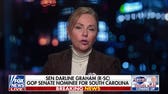 Sen Darline Graham calls opponent a 'slick-talking, used car salesman'