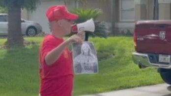 Man with loudspeaker tries to communicate with fiance of Gabby Petito outside his home