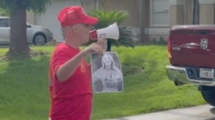 Man with loudspeaker tries to communicate with fiance of Gabby Petito outside his home