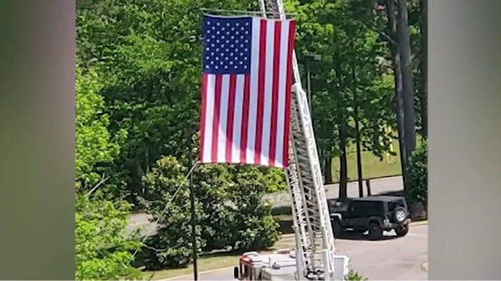 Alabama firefighters raise flag to honor veterans hit by COVID-19