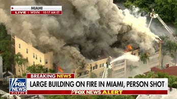 Miami apartment building on fire, 1 reportedly shot inside