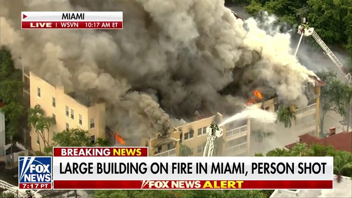 Miami apartment building on fire, 1 reportedly shot inside