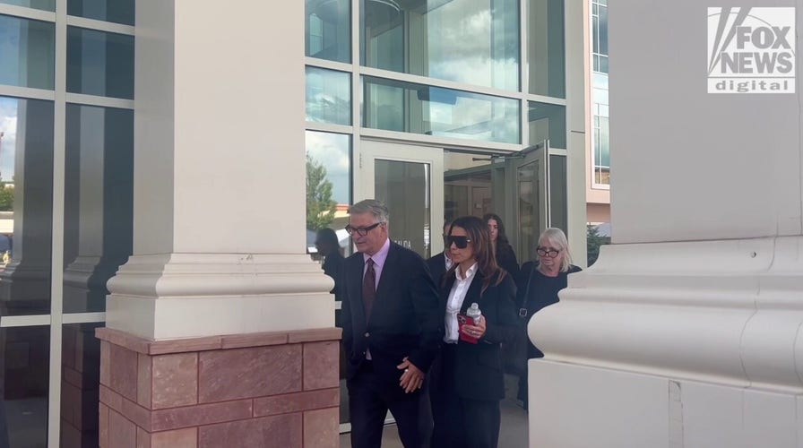 Alec Baldwin departs court alongside wife