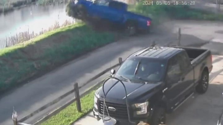 Truck driven by suspected drunk driver goes airborne, crashes into Michigan lagoon