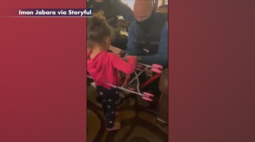 New Jersey officers rescue girl from doll stroller, then buys her a new one