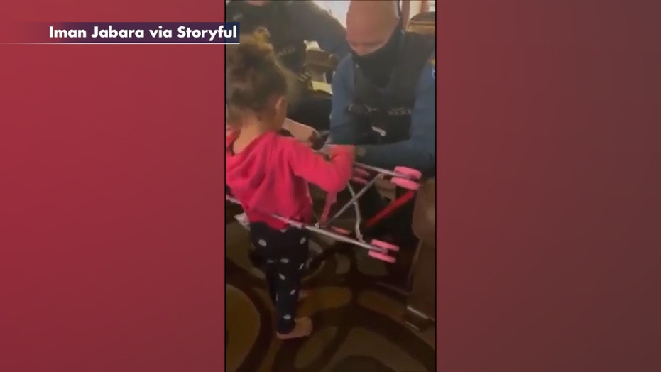 New Jersey police officers rescue girl from doll stroller, buy her a