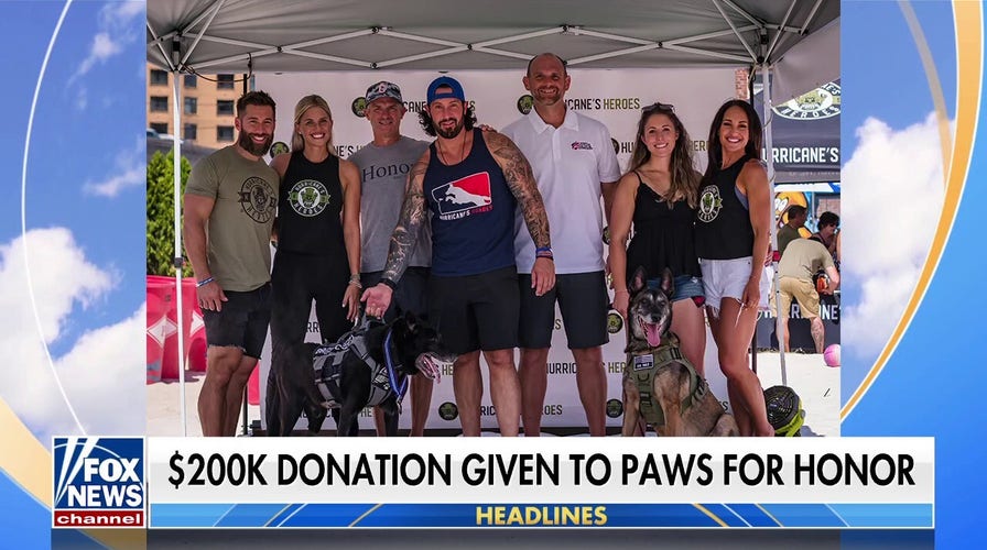 Hero dogs honored with $200K donation to Paws for Honor