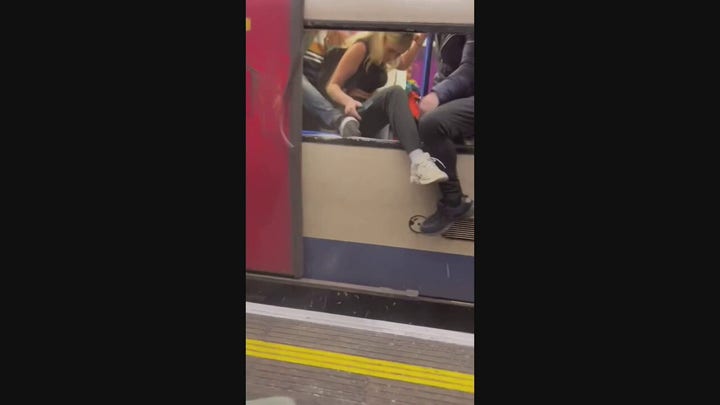London Tube car fills with smoke, commuters break windows to escape