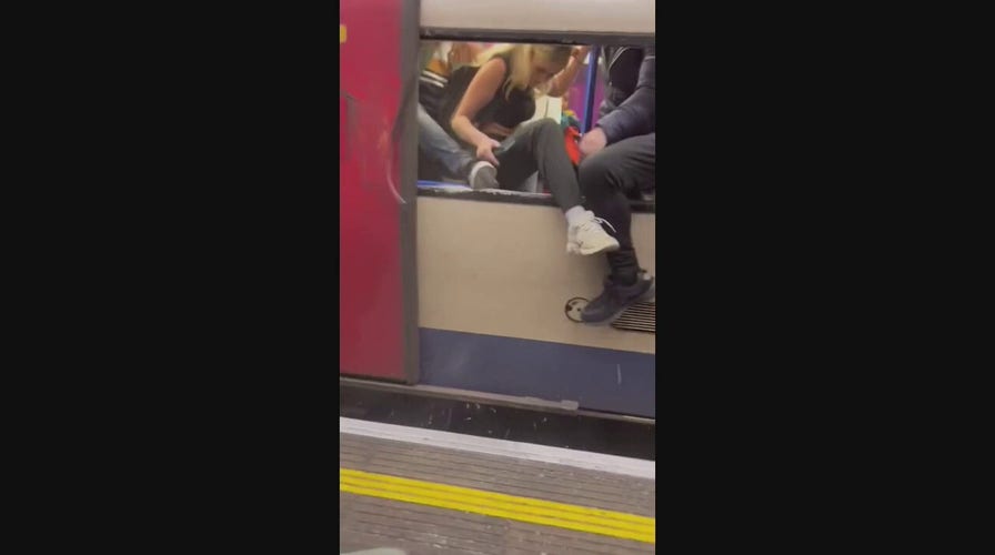 London Tube commuters break windows to escape smoke hours before