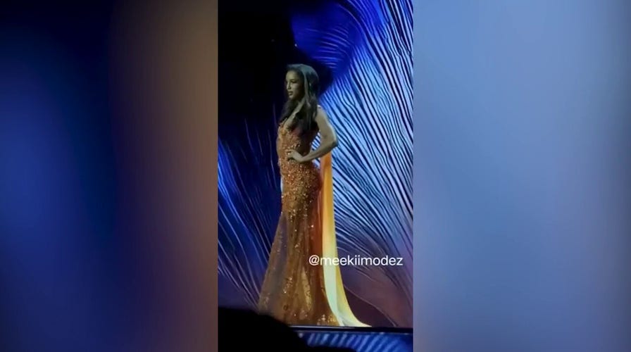Miss Universe Jamaica contestant falls disconnected  signifier    during evening gown round