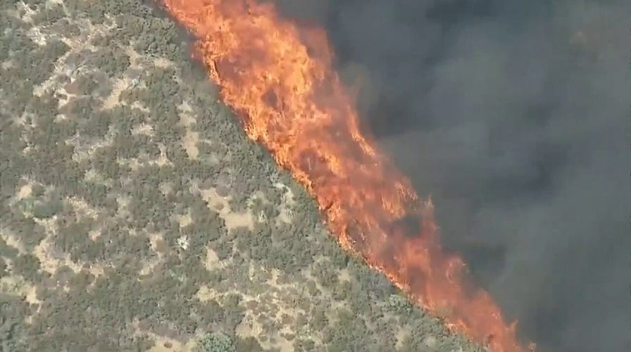 Raw video: Brush fire burns near Lake Hughes, California