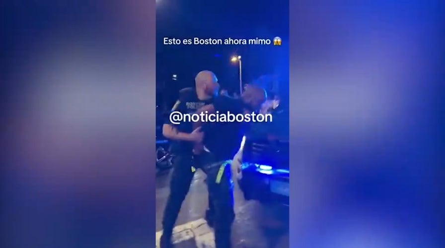 Rowdy Boston crowd throws trash, glass at police officer during takeover