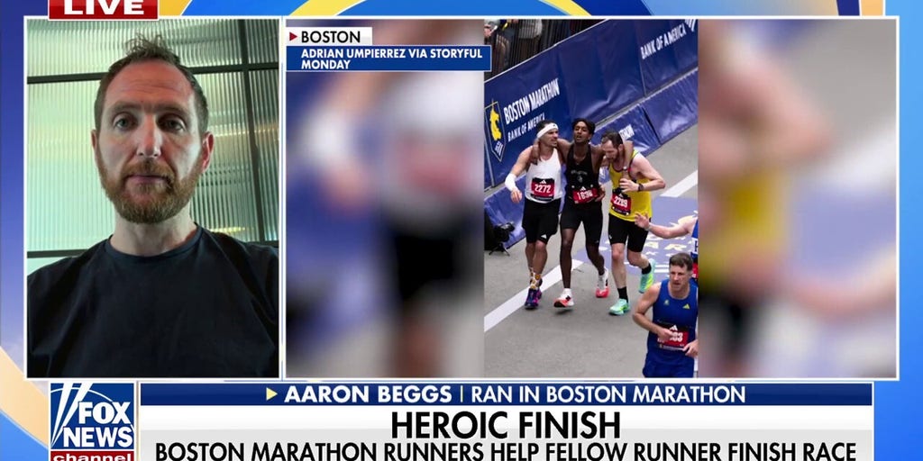 Boston Marathon runners help fellow competitor finish race
