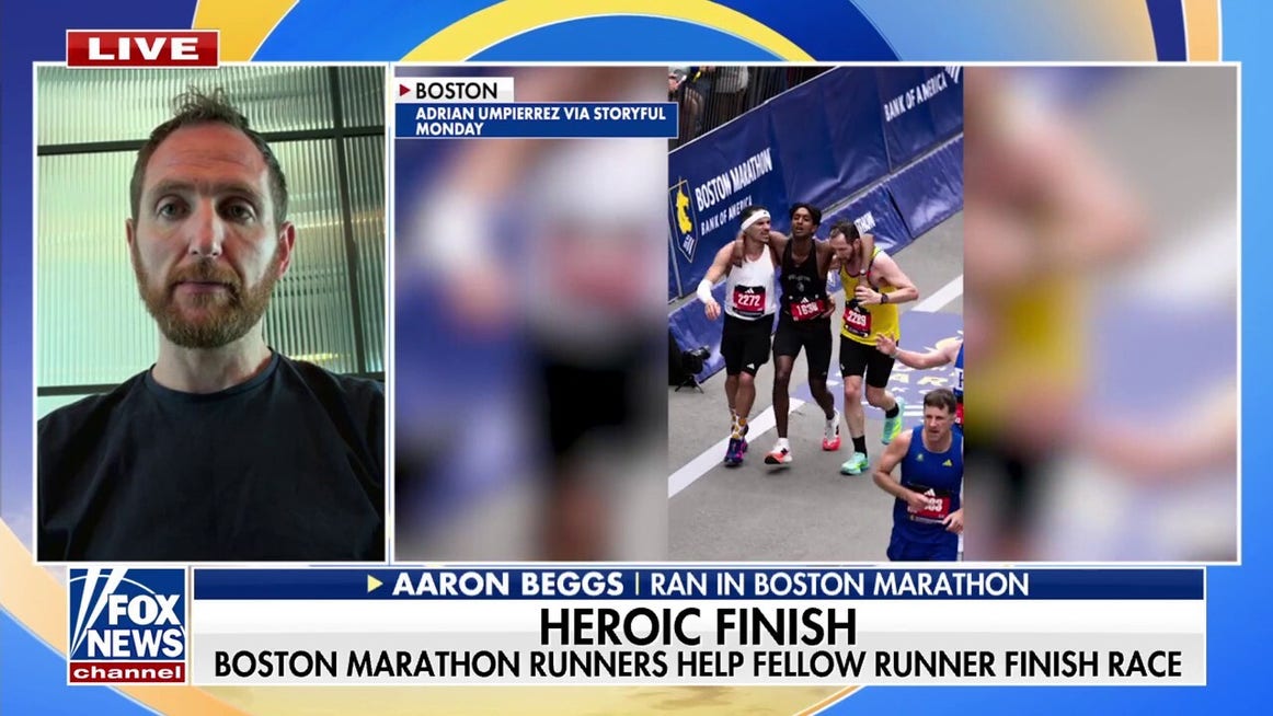 Boston Marathon runners help fellow competitor finish race