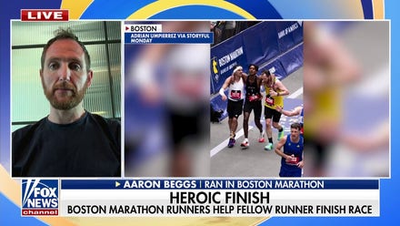 Boston Marathon runners help fellow competitor finish race