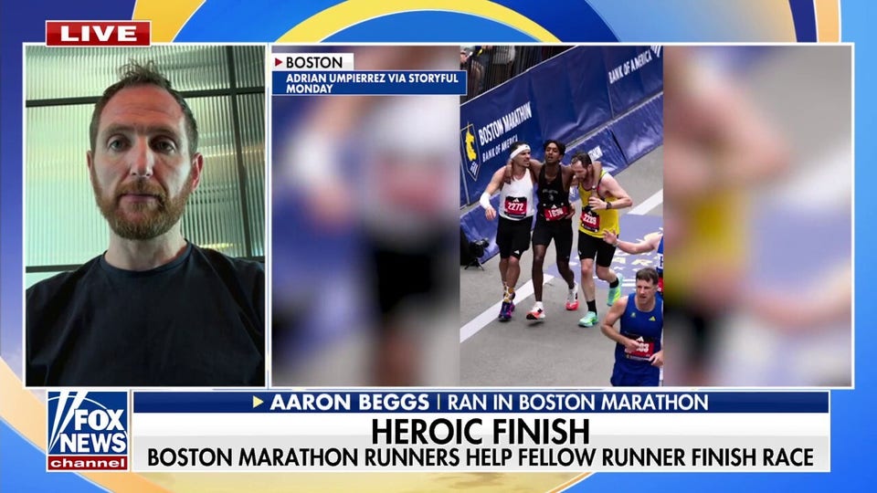 Boston Marathon runners help fellow competitor finish race