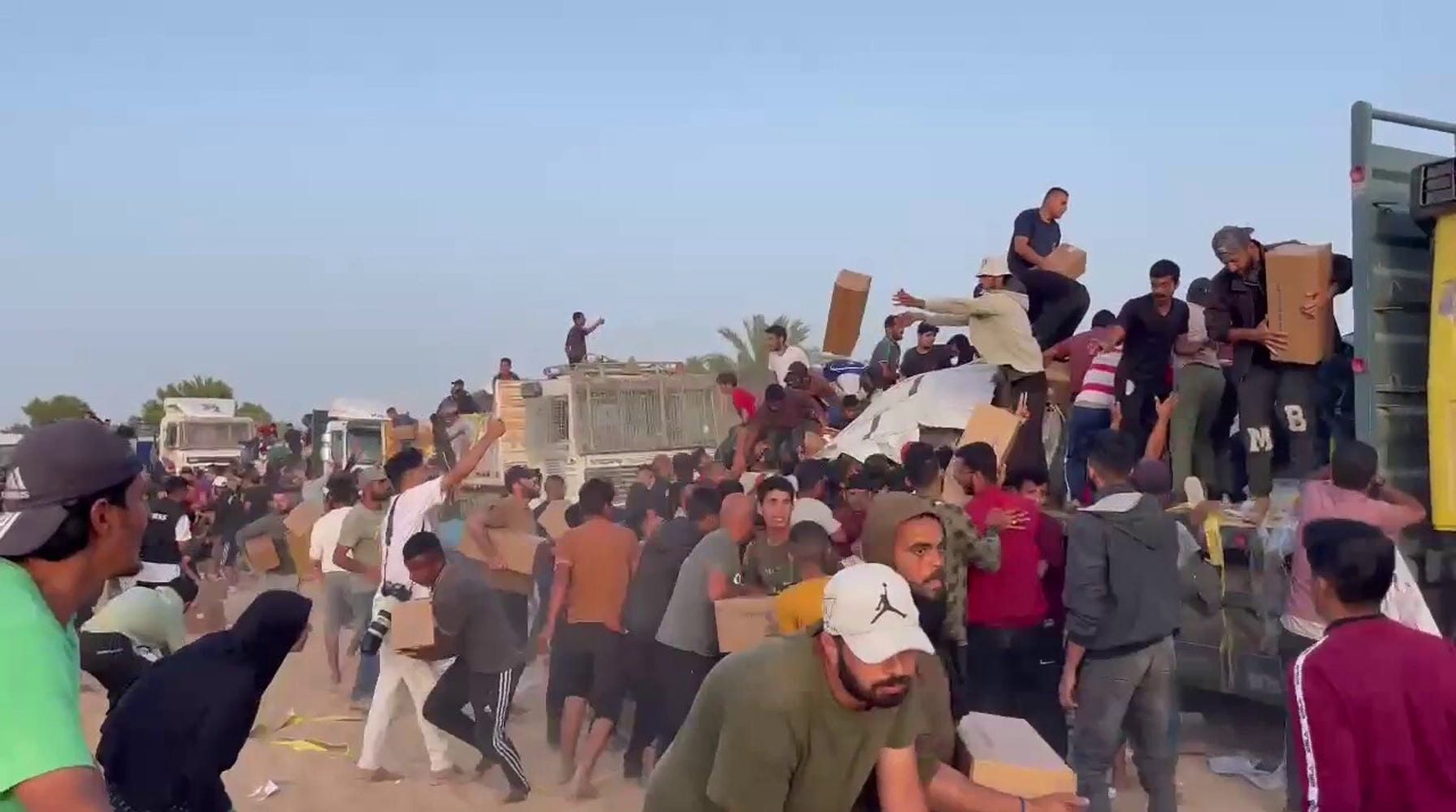 Chaos in Gaza: Palestinians Swarm and Loot Aid Convoy, Exposing Distribution Disarray