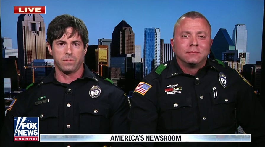 Hero Texas police officers rescue man from burning car