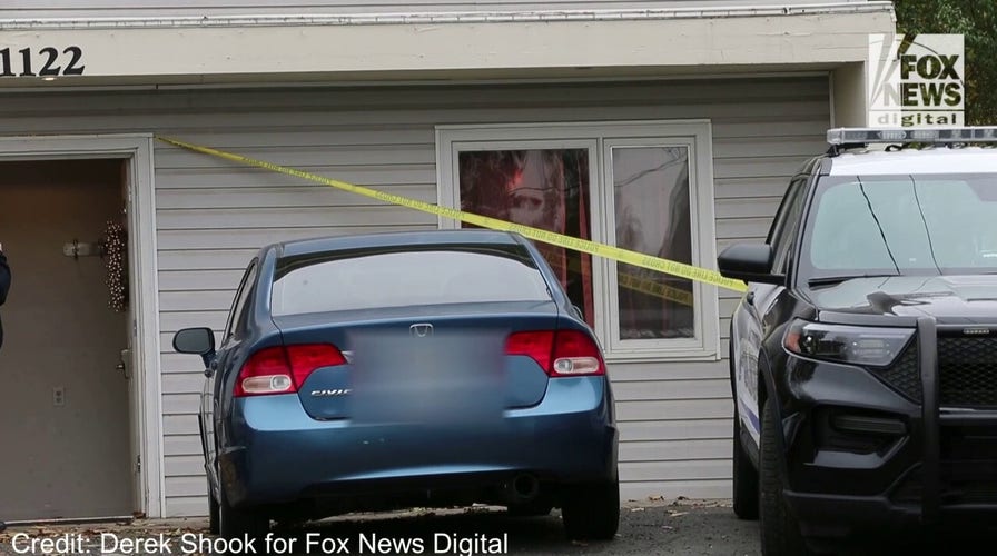 Police investigate the scene of a quadruple homicide in Moscow, Idaho