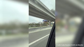 More than 100 firefighters battle blaze that spread to Austin hotel