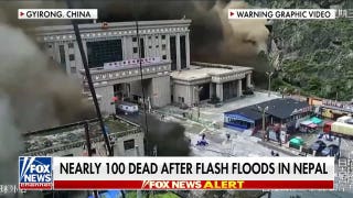 Nearly 100 dead after Nepal flash flood