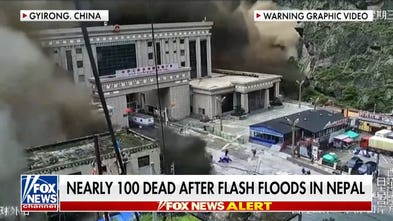 Nearly 100 dead after Nepal flash flood