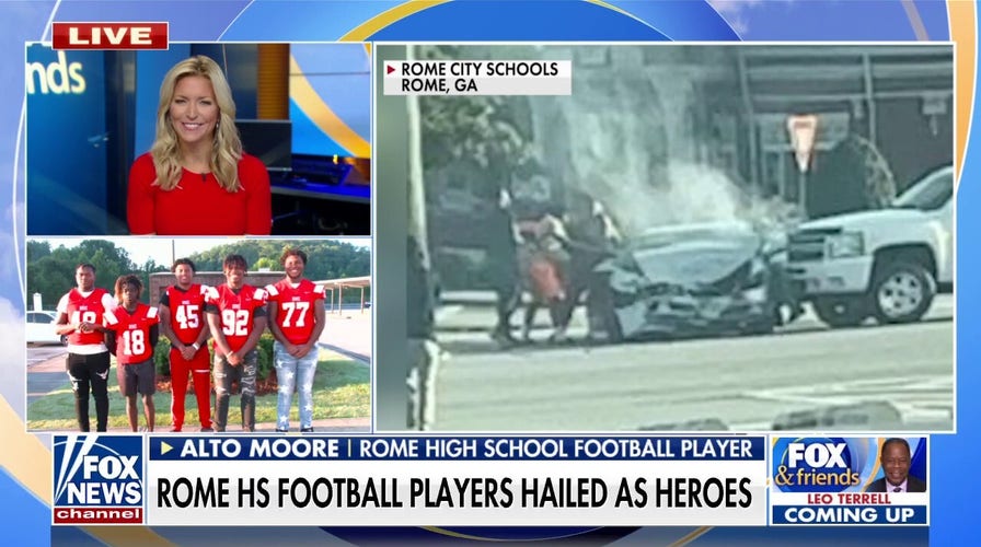 Georgia high school football players save woman from car crash