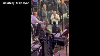 Former NJ Gov. Chris Christie left hanging as Bruce Springsteen passes him at concert
