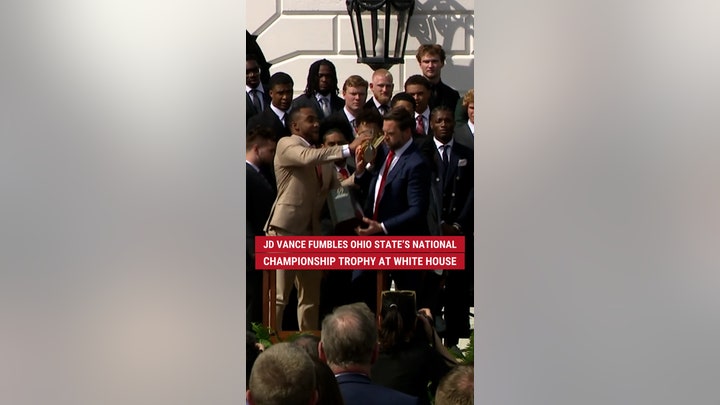 VP JD Vance fumbles Ohio State's national championship trophy at White House