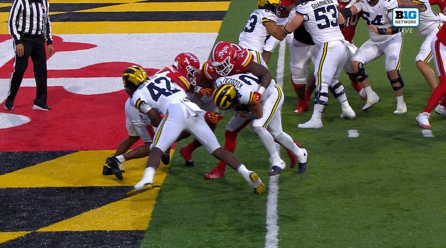 Michigan's Bryson Kuzdzal rushes 2-yard TD, taking pb  implicit    Maryland