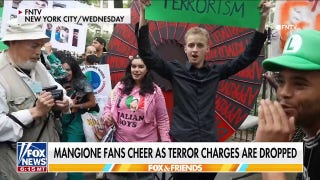 Crowd cheers after judge drops terror charges against Luigi Mangione
