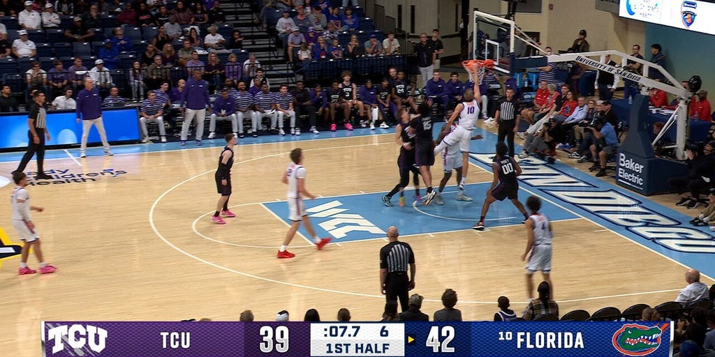 Thomas Haugh cuts inside for a one-handed slam, extending Florida's lead over TCU