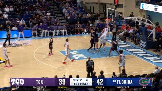 Thomas Haugh cuts inside for a one-handed slam, extending Florida's lead over TCU