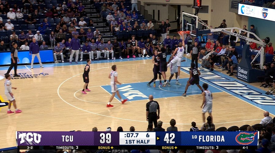 Thomas Haugh cuts wrong  for a one-handed slam, extending Florida's pb  implicit    TCU