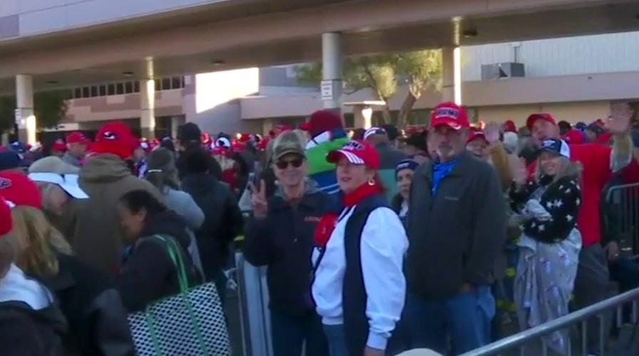Trump supporters line up in Las Vegas for midday campaign rally