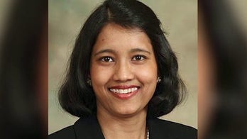 Texas cancer researcher killed in 'random attack’ during jog is remembered as details emerge about person of interest