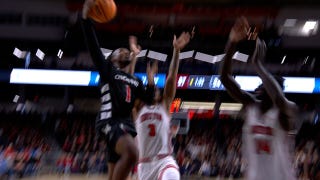Day Day Thomas powerful drive towards the basket extends Cincinnati's lead over No. 8 Houston