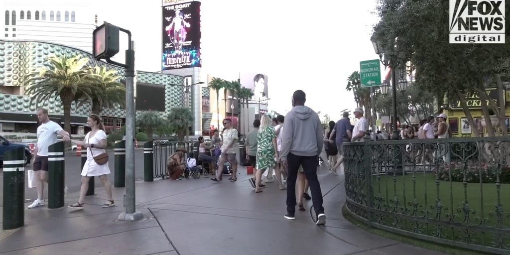 Tourists stroll Las Vegas streets as city struggles with drop in visitor rates