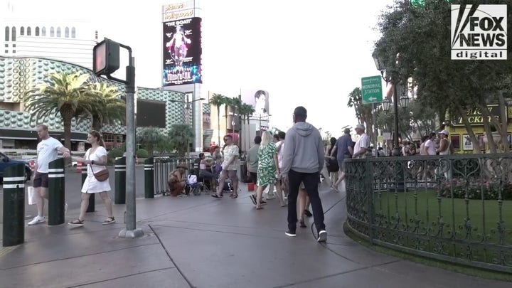 Tourists stroll Las Vegas streets as city struggles with drop in visitor rates