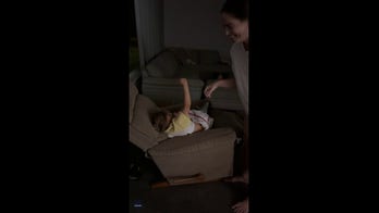 Toddler pretends to be in deep sleep but ends up being pranked by her parents
