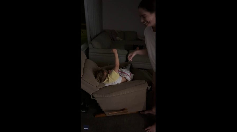 Toddler pretends to be in deep sleep but ends up being pranked by her parents