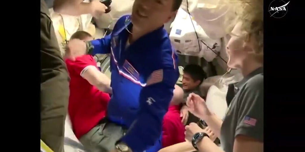 NASA astronaut Jonny Kim enters International Space Station after arriving on Russian spacecraft