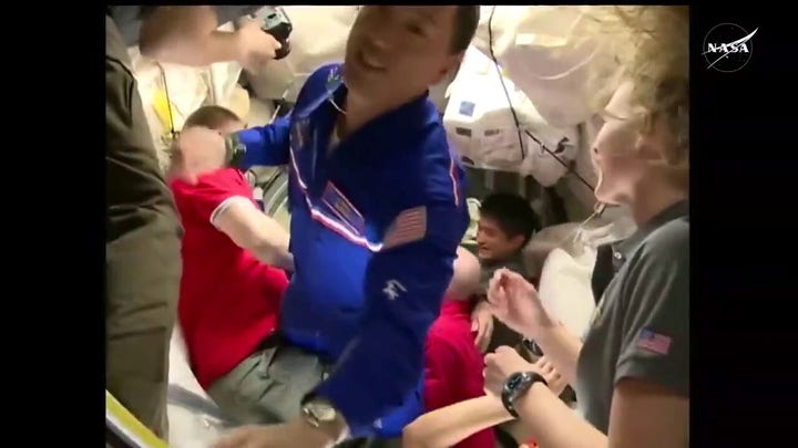 NASA astronaut Jonny Kim enters International Space Station after arriving on Russian spacecraft