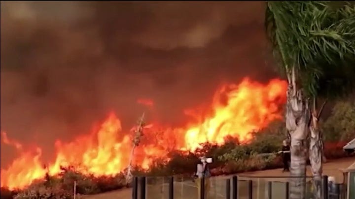 Firefighters work around clock battling dozens of wildfires in Western US